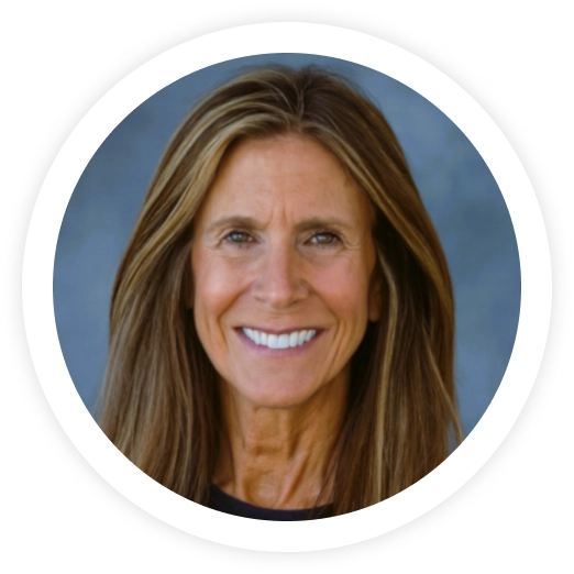 Professional headshot of woman with long light brown hair smiling