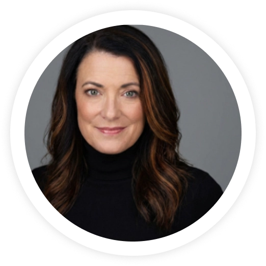 Professional headshot of woman with dark hair and black top